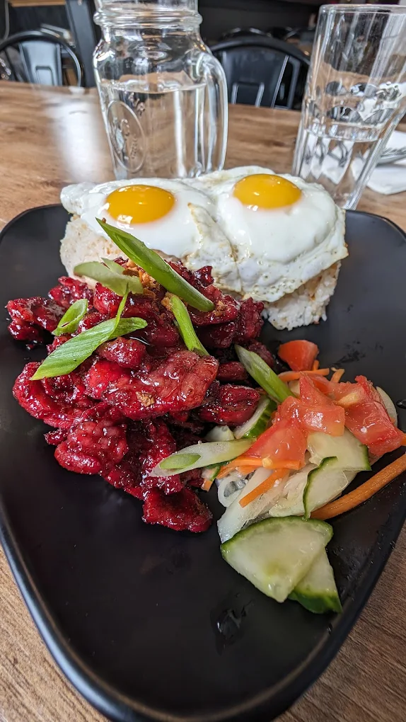 Lechon Baka at Jeepney Winnipeg — award-winning roast beef brisket with Java rice
