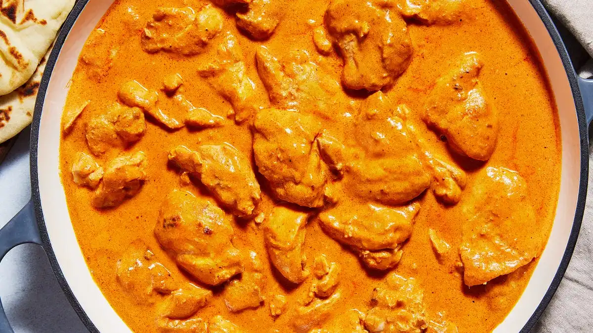 Bagnet Kare-Kare — crispy pork belly in peanut curry at Jeepney Winnipeg