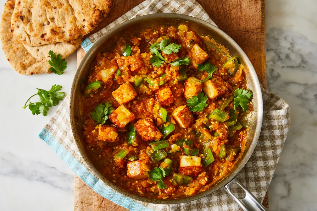 Ilocos Empanada — Filipino savoury pastry with longganisa and egg at Jeepney Winnipeg